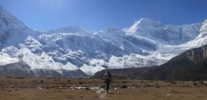 Headed to a high checkpoint under the watchful eye of Manaslu, world's eight highest mountain, on the Manaslu Trail Race.